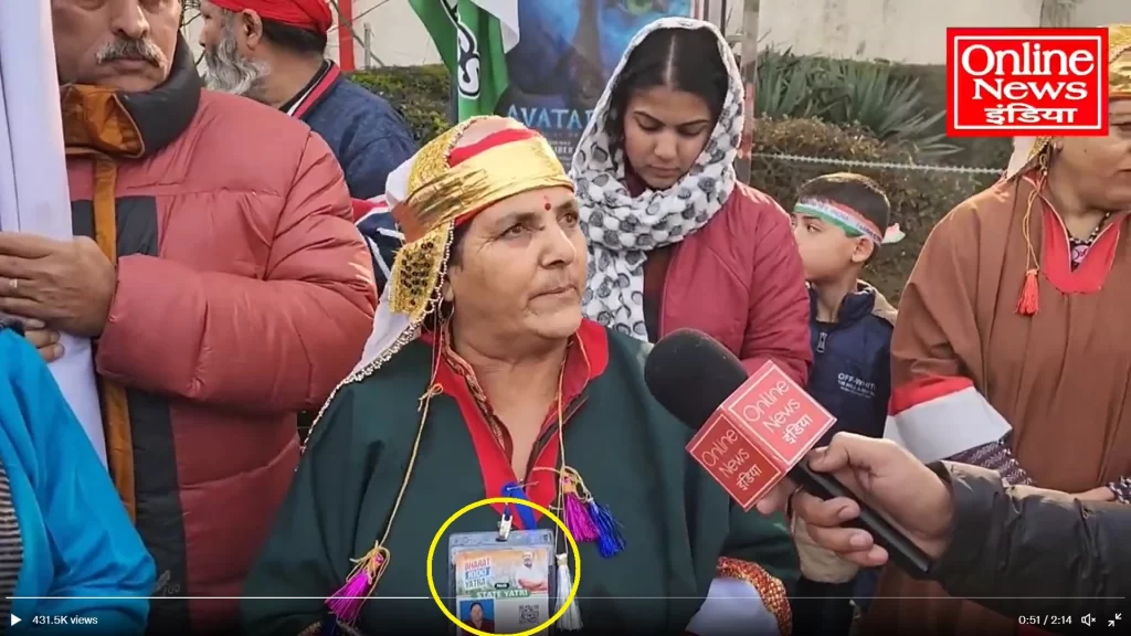 A Kashmiri pandit woman, the wife of a Congress activist, is carrying a State Yatri identification card.
