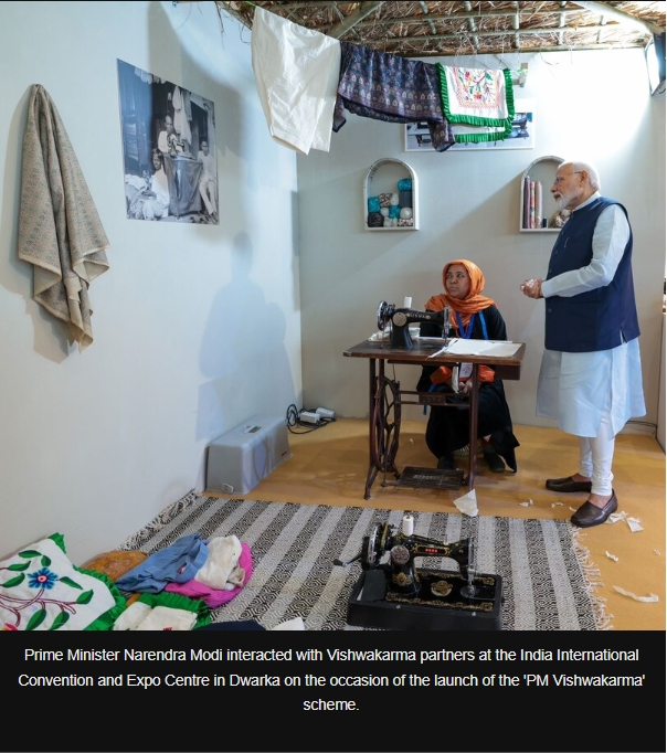 The image of PM Modi interacting with a woman in hut is from PM Vishwakarma Scheme launch exhibition. 