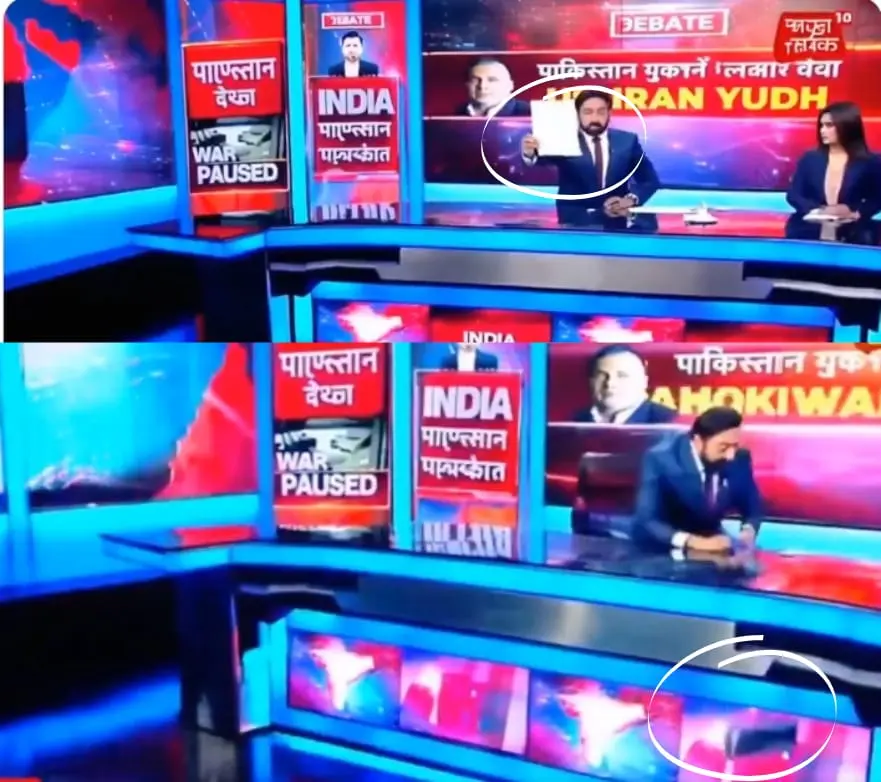 In the video TV anchor throws a white paper, which abruptly turns black in the air.